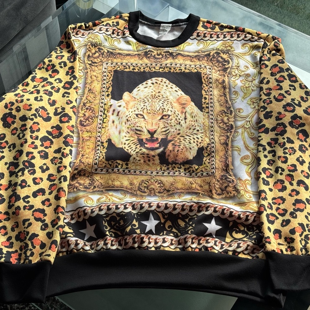 Black and gold large men’s pullover. Worn only once and in great condition!